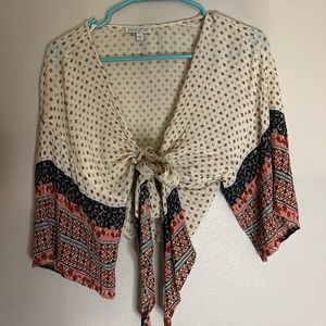 Patrons of peace wrap top